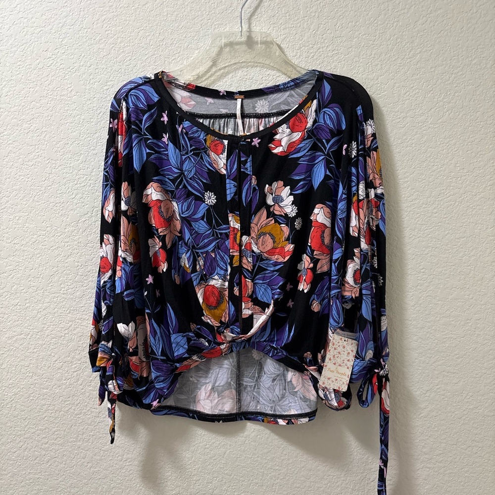 Free People Keeping on long sleeve knit twist front and tied cuffs. Size XS. NWT